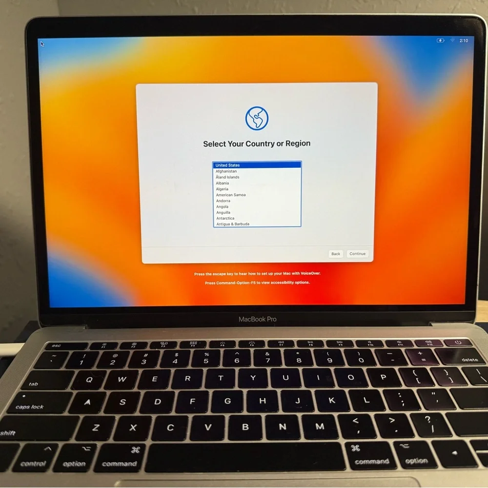 Apple MacBook in Classic Silver with Accessories